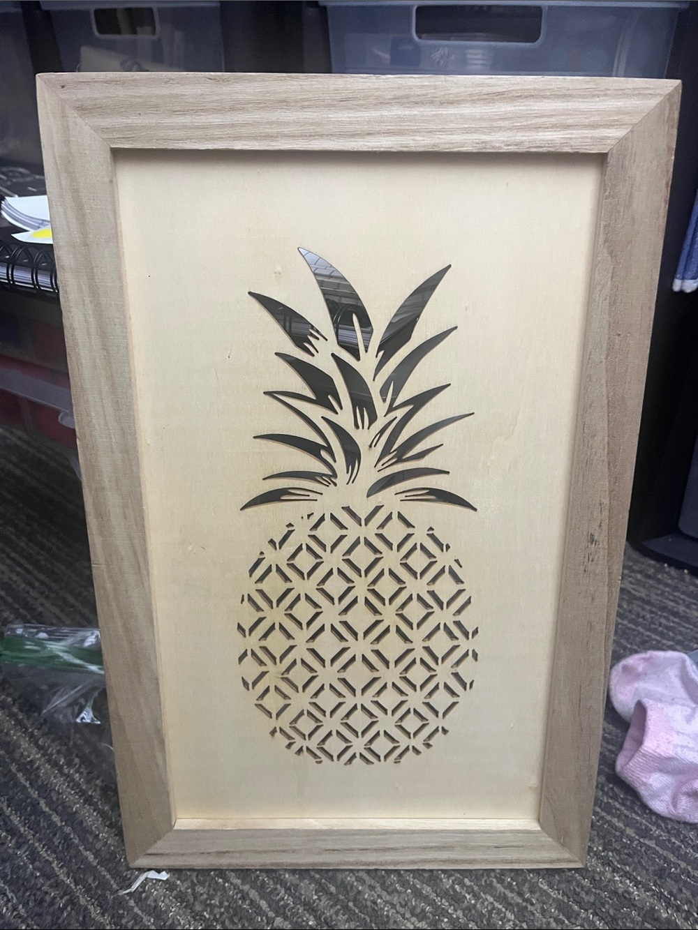 14” x 9” wide wooden wall art with cut out of pineapple on a light wood 406